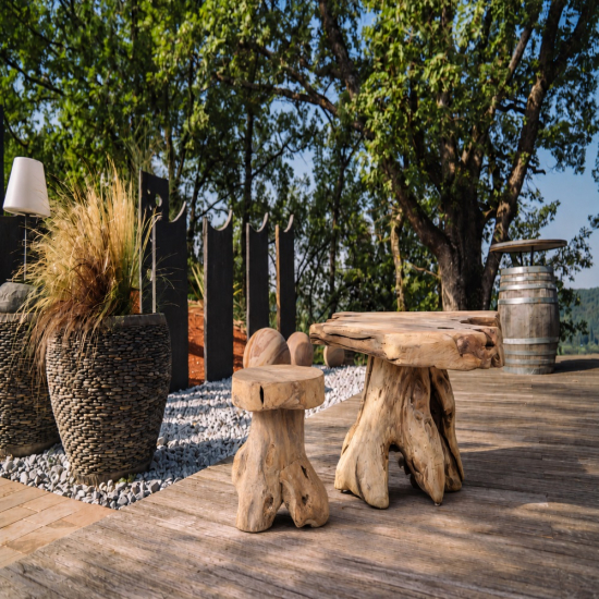 Tabouret tranche racine de teck massif